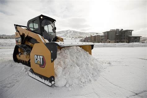 plowing snow with a skid steer|best skid steer snow pusher.